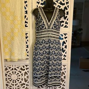 Nicole- beautiful lined , blue, black and white print dress. Size 4